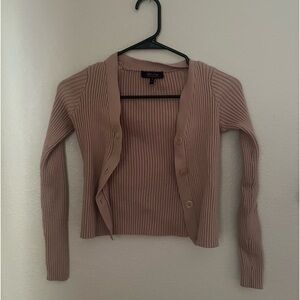 This is a little cardigan worn a few times and its from witty fox